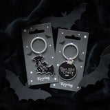 Black Round Bat Shit Crazy Keyring